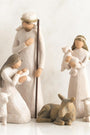 Nativity scene figurines with Mary, Joseph, baby Jesus, and animals on a white background
