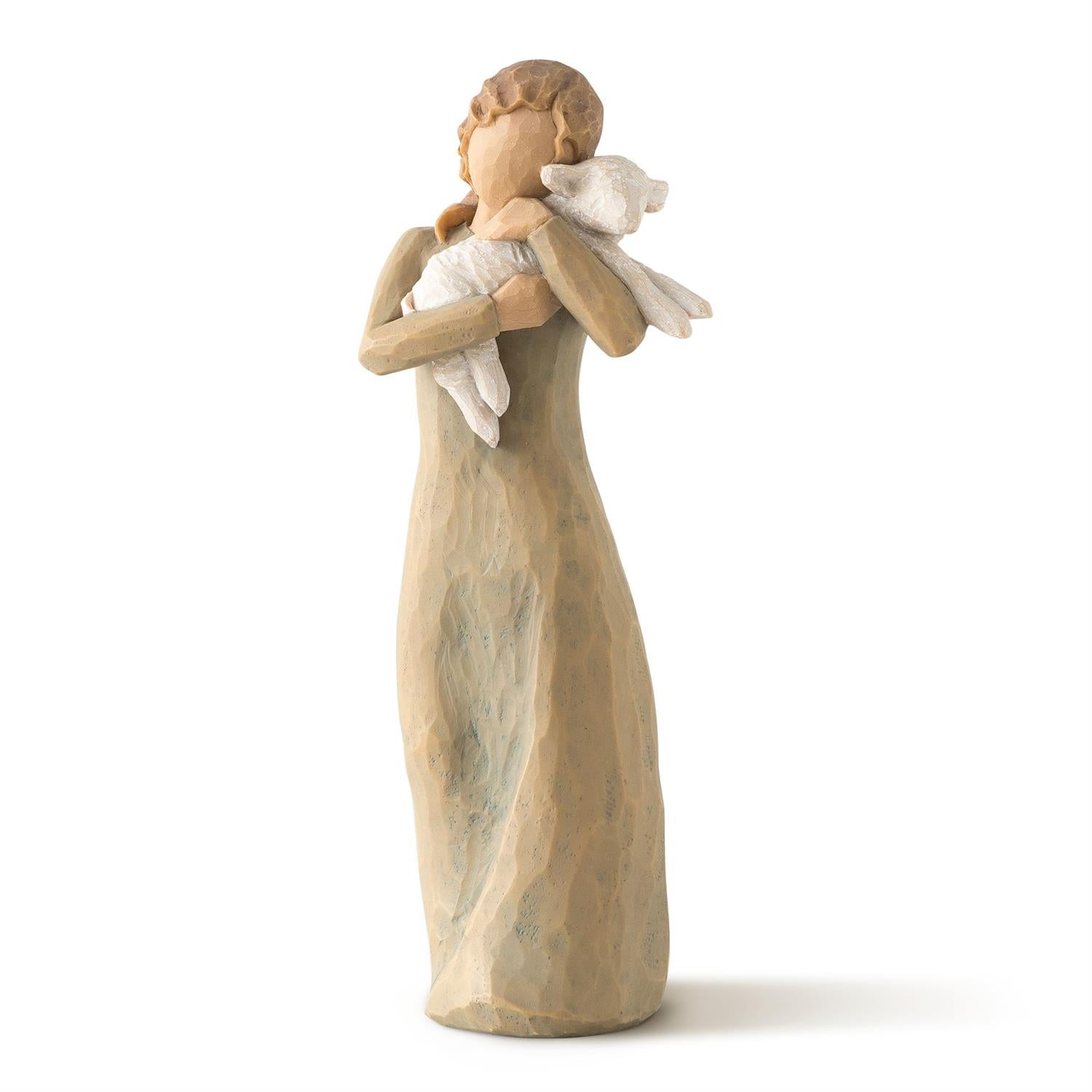 Decorative figurine of a woman holding a dove on a white background