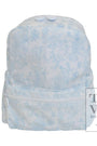 Light blue tie-dye backpack on a white background with 'TRVL Design' branding.