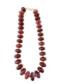 Chunky beaded necklace with maroon glass-style beads and gold-tone clasp