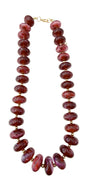 Chunky beaded necklace with maroon glass-style beads and gold-tone clasp