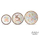 Set of three decorative bowls with floral patterns on a white background