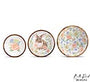 Set of three decorative bowls with floral patterns on a white background