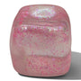 Pink glittery container on a white background