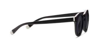 Black sunglasses with white accents on a white background