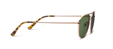 Sunglasses with gold frame and green lenses on a white background