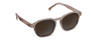 Sunglasses with brown frames and dark lenses on a white background