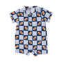 A baby short-sleeve romper with a navy blue and white pinstripe background, featuring a repeating pattern of brown footballs and a matching chest pocket.