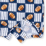 Children's underwear with football pattern on a blue and white striped background