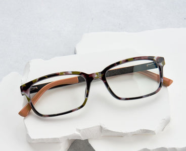 Pair of glasses with multicolor frame on a white background