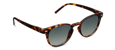 Sunglasses with tortoiseshell frame and dark lenses on a white background