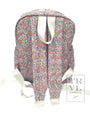 Floral-patterned backpack with visible branding on a white background
