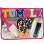 Pink zippered candy bag with clear front and bold 'TUMBLE' patch, filled with hair accessories