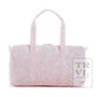 Pink and white patterned duffel bag with 'TRVL DESIGN' branding on a white background