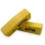 Two yellow blocks of 'Salted Butter' on a white background
