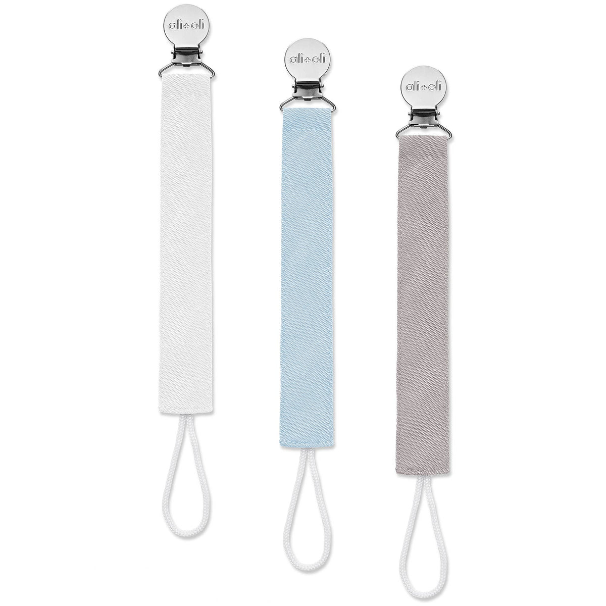 Set of 3 linen pacifier clips: white, light blue, and gray with metal clasps and ties