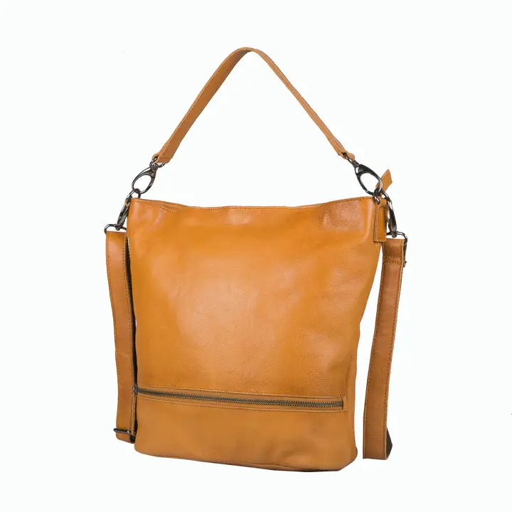 Brown leather handbag with a shoulder strap on a white background