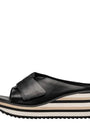 Black wedge sandal with a bow on a white background
