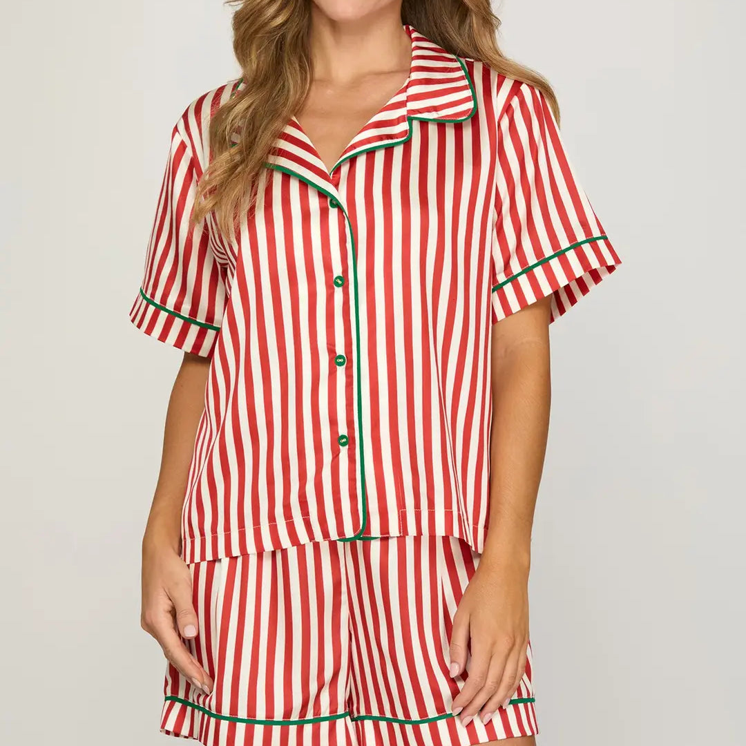 STRIPED WOVEN PRINT SHORT SLEEVE TOP AND SHORTS PAJAMA SET WITH CONTRAST PIPING DETAIL - has red and white stripes with green trim