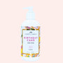 Body wash bottle labeled 'Birthday Cake' by 'Honestly Margo' on a light pink background