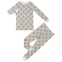 Children's pajama set with teddy bear pattern on a white background