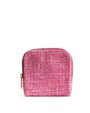 Pink textured pouch with a gold zipper on a white background