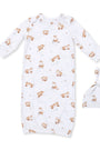 A baby sleep sack and matching knotted beanie hat set, both in white fabric with an all-over print of brown foxes and small beige leaves, displayed on a solid white background.