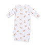 A long-sleeve baby sleep sack in white fabric, featuring an all-over print of small brown and beige foxes.