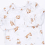 A white long-sleeve baby top with an all-over print of playful brown foxes and rabbits, featuring a chest pocket and shoulder snaps.