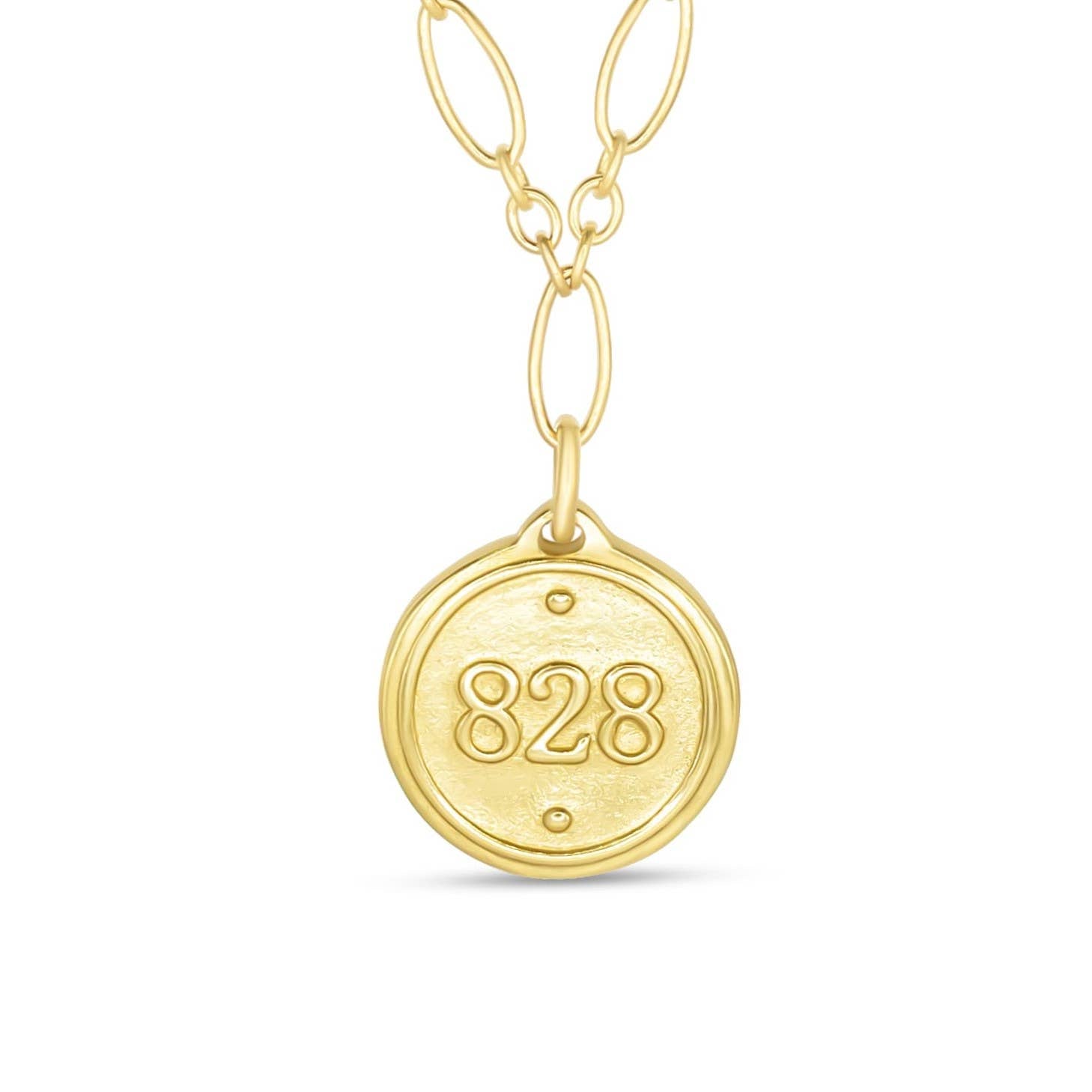 Gold necklace with a round pendant featuring the number 828 on a white background