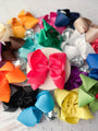 Colorful hair bows on a white background