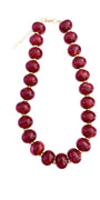 Chunky beaded necklace with marbled red oval beads and gold-tone chain