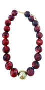 Chunky beaded necklace with maroon round beads, rainbow speckles, and gold-toned spacers