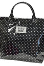 Black polka dot tote bag with 'LULU MAC' label on a white background