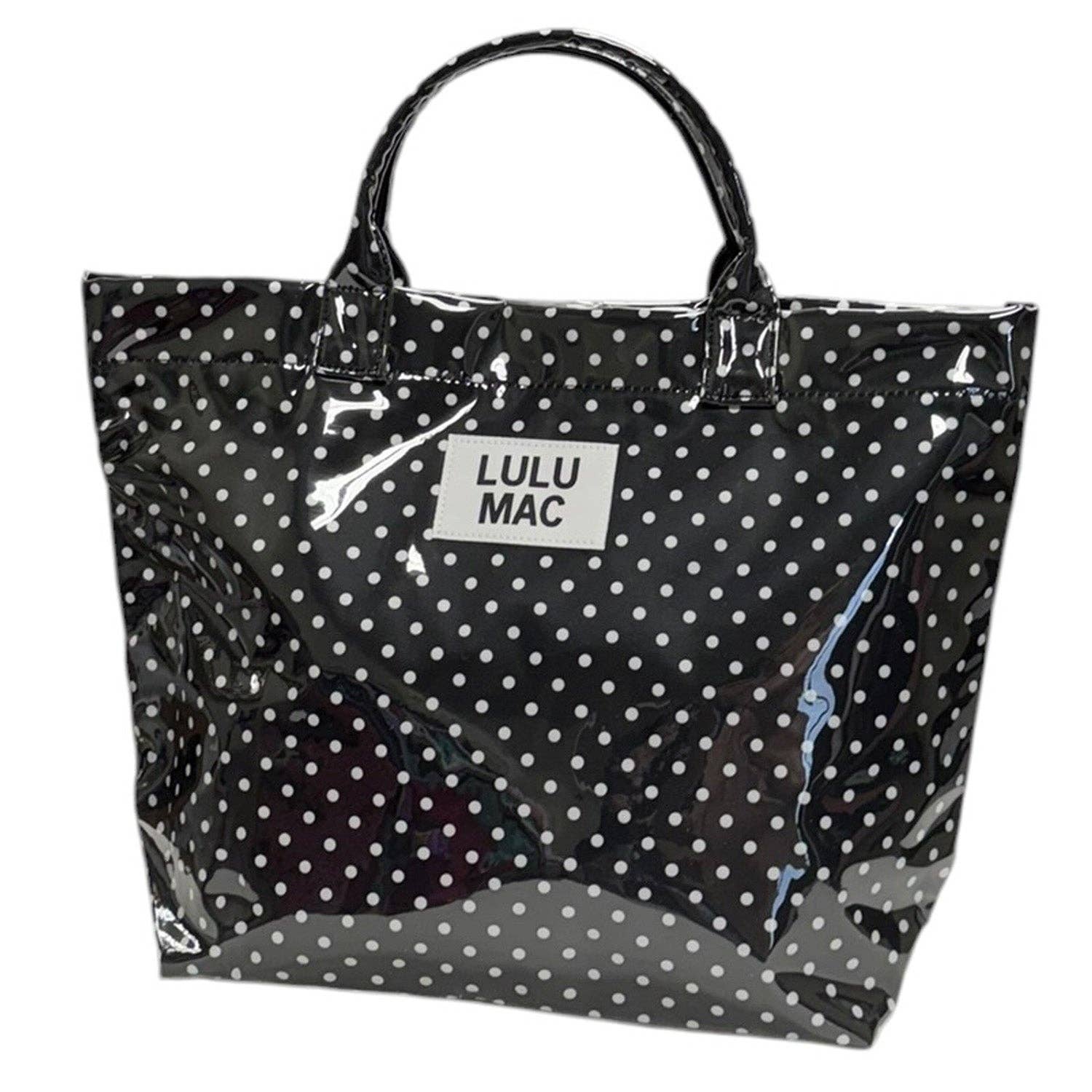 Black polka dot tote bag with 'LULU MAC' label on a white background