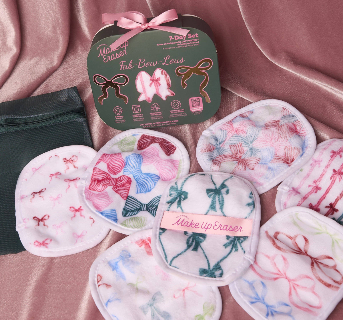 7-day makeup eraser set with six pastel round cloth erasers and a green pouch