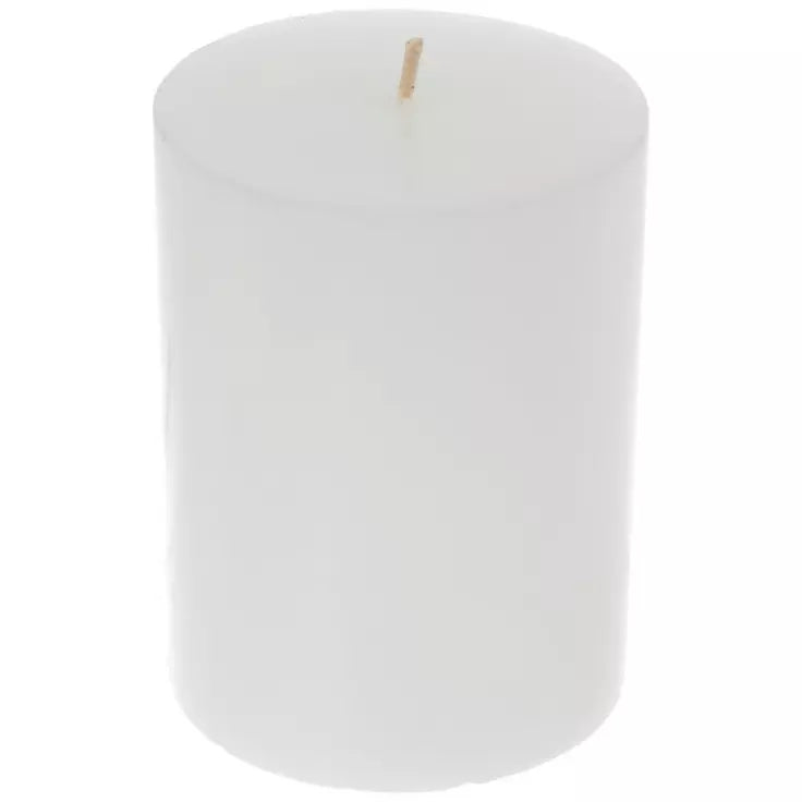 A plain white cylindrical pillar candle with a single wick, shown against a solid white background.