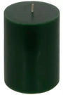 A dark green cylindrical pillar candle with a single wick, shown against a plain white background.