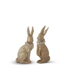 Two decorative rabbit figurines on a white background