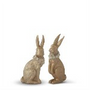 Two decorative rabbit figurines on a white background