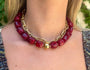 Maroon chunky beaded necklace with gold-tone chain links and center clasp