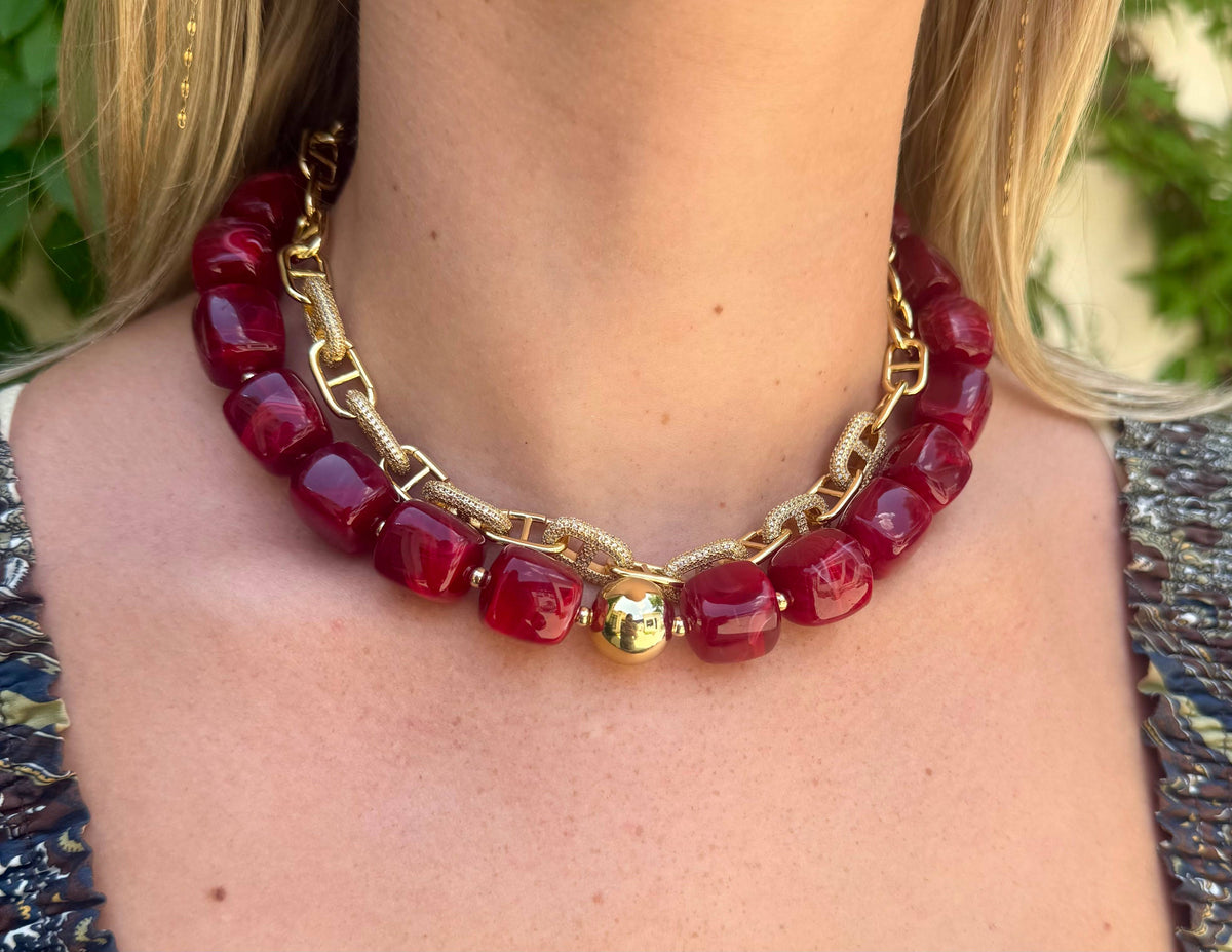 Maroon chunky beaded necklace with gold-tone chain links and center clasp