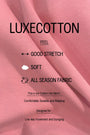 Pink textured fabric background with black text reading 'LUXECOTTON' and feature callouts including 'FEEL GOOD STRETCH', 'SOFT', and 'ALL SEASON FABRIC'.