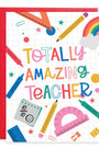Card with colorful text 'Totally Amazing Teacher' surrounded by school supplies on a red border.