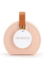 Round pink leather tag with a brown strap and gold accent on a white background