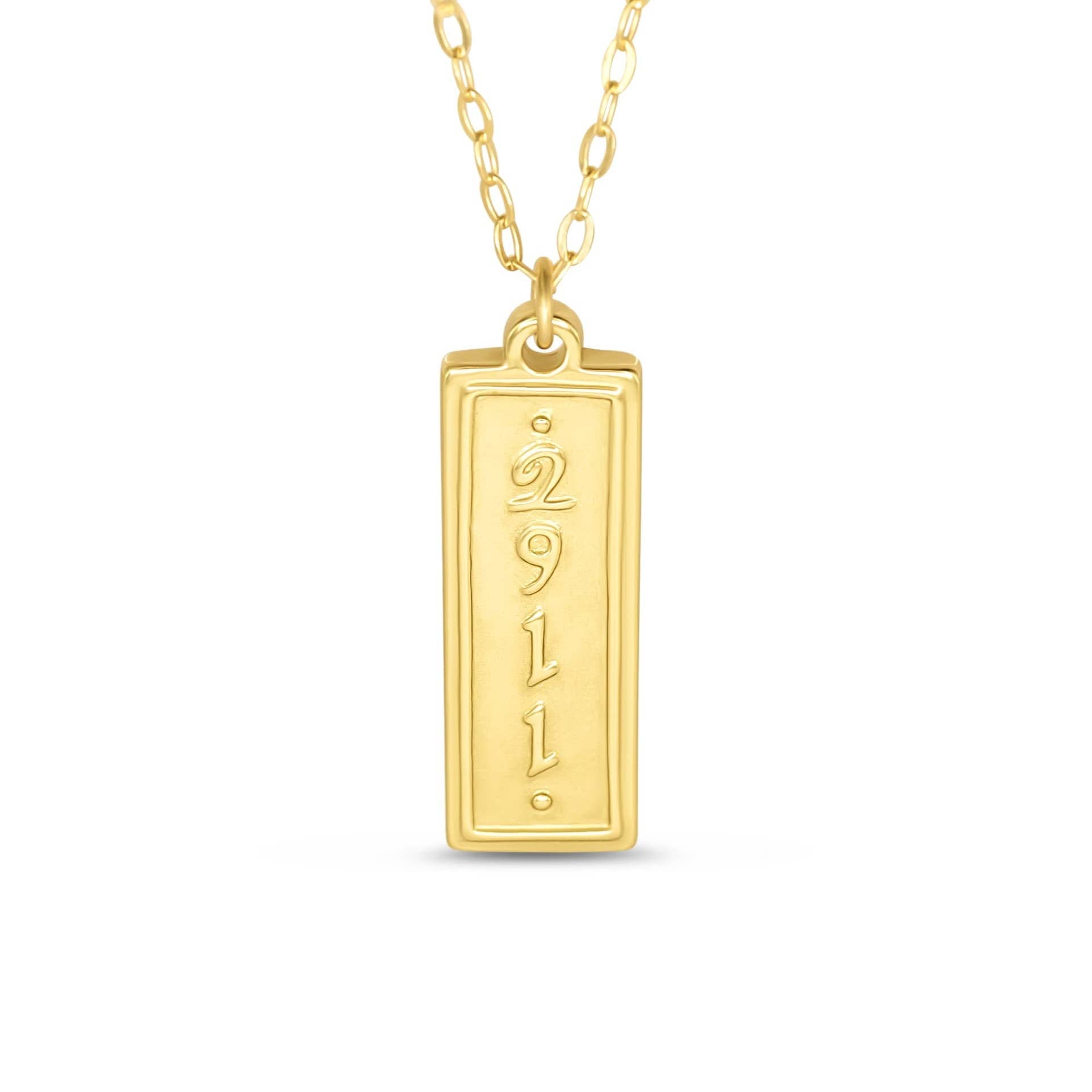 Gold necklace with a rectangular pendant on a white background