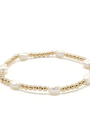 Bracelet with gold beads and pearls on a white background