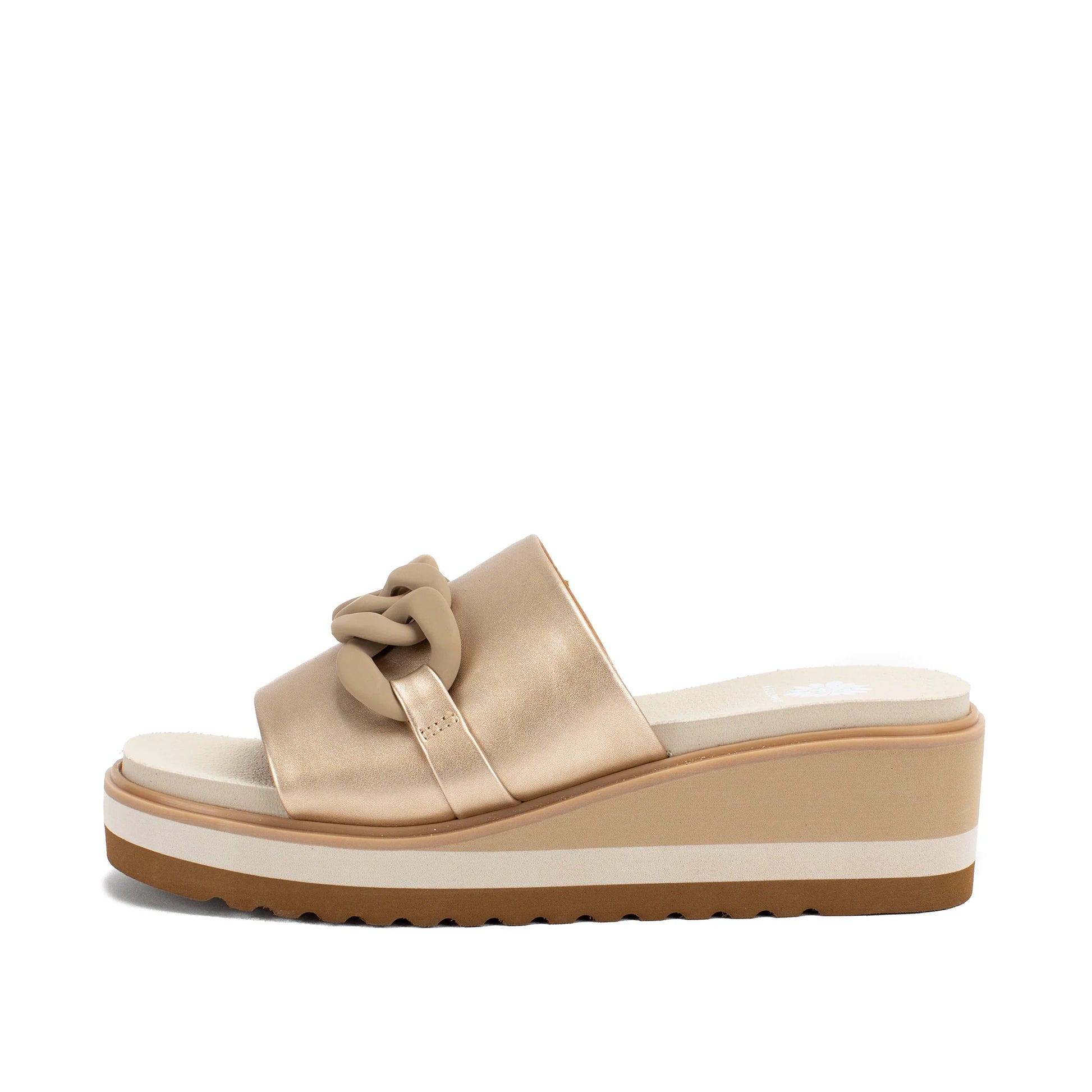 Beige wedge sandal with a platform sole on a white background