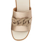 Beige sandal with chain detail on a white background