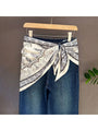 Triangle bandana scarf with muted grey vintage paisley pattern and cream edges